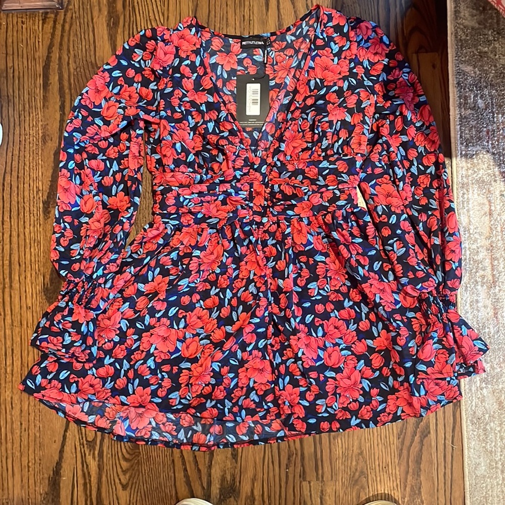 Pretty Little Thing red and blue floral button up dress.